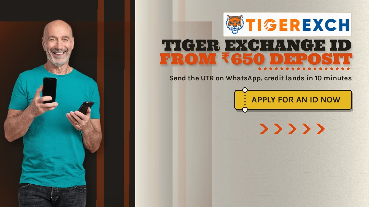 Tiger Exchange Id from ₹650 deposit banner: Send the UTR on WhatsApp, credit lands in 10 minutes; gold ticket-stub button reading Apply For An Id Now, adult man in a plain solid teal t-shirt holding ONE black smartphone in his right hand at the left