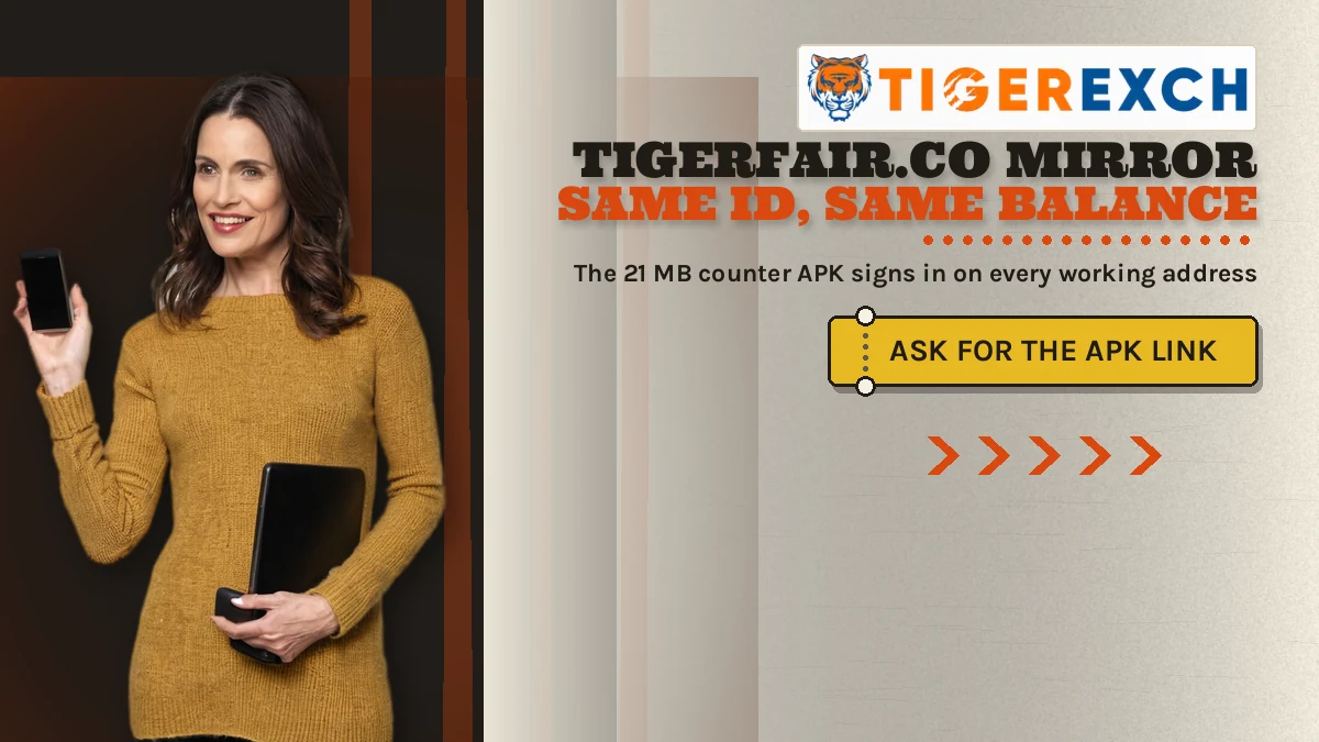 Tigerfair.Co Mirror same id, same balance banner: The 21 MB counter APK signs in on every working address; gold ticket-stub button reading Ask For The Apk Link, adult woman in a plain mustard knit top holding ONE black smartphone in her right hand at the left